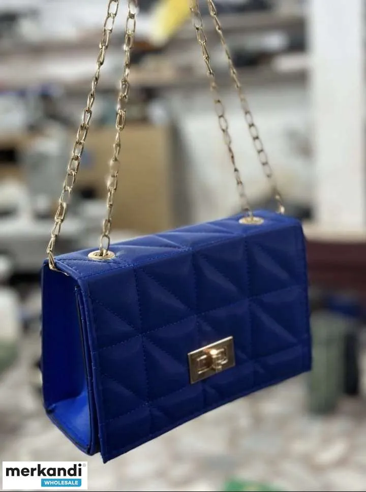 Bolsos de mujer de moda, al por mayor, muchas variantes de color.