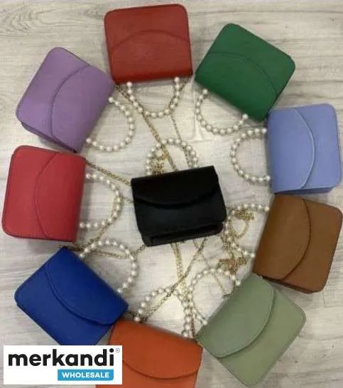 Bolsos de mujer de moda, al por mayor, muchas variantes de color.