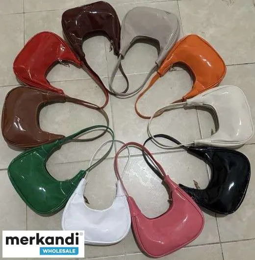 Bolsos de mujer de moda, al por mayor, muchas variantes de color.