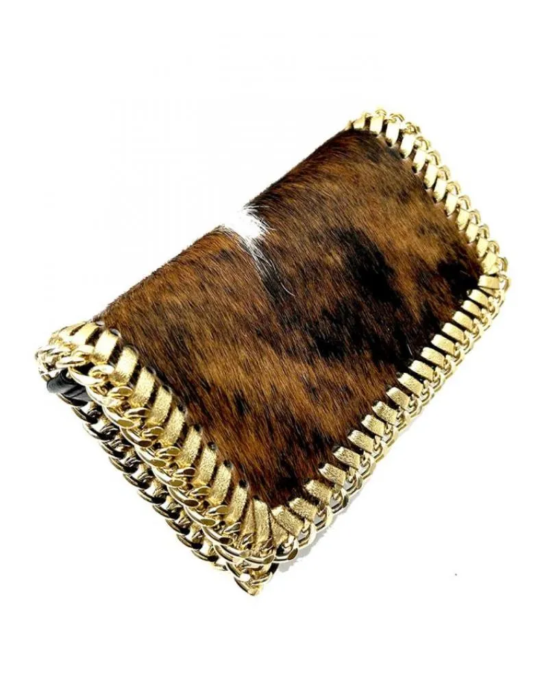 BOLSOS DE PIEL ANIMAL PRINT DE VACA TONOS MARRONES BLANCOS Y NEGROS