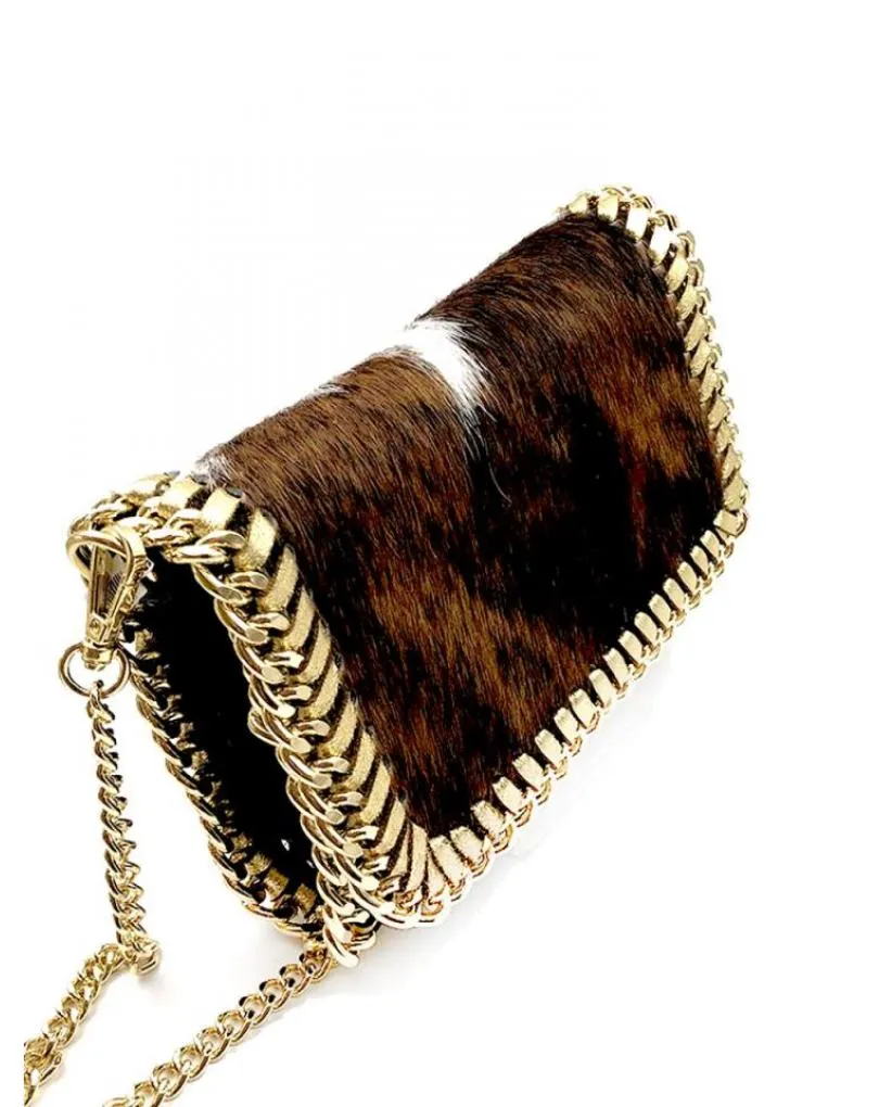 BOLSOS DE PIEL ANIMAL PRINT DE VACA TONOS MARRONES BLANCOS Y NEGROS