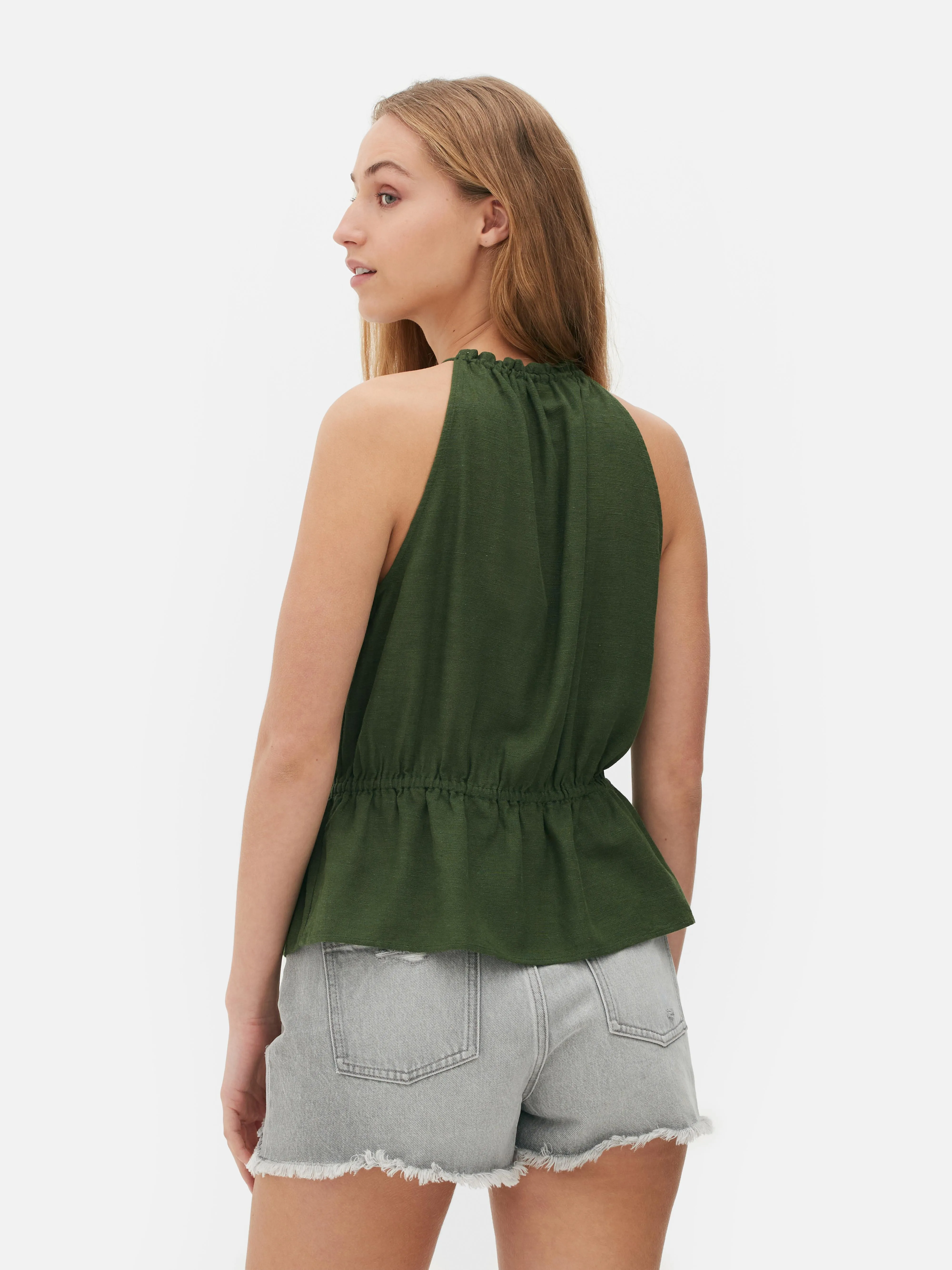 Top con espalda nadadora y péplum